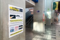A photo shows a poster warning of the dangers of fentanyl use in a high school hallway.