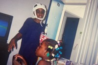 An old photo shows a young Oronde McClain with his sister.