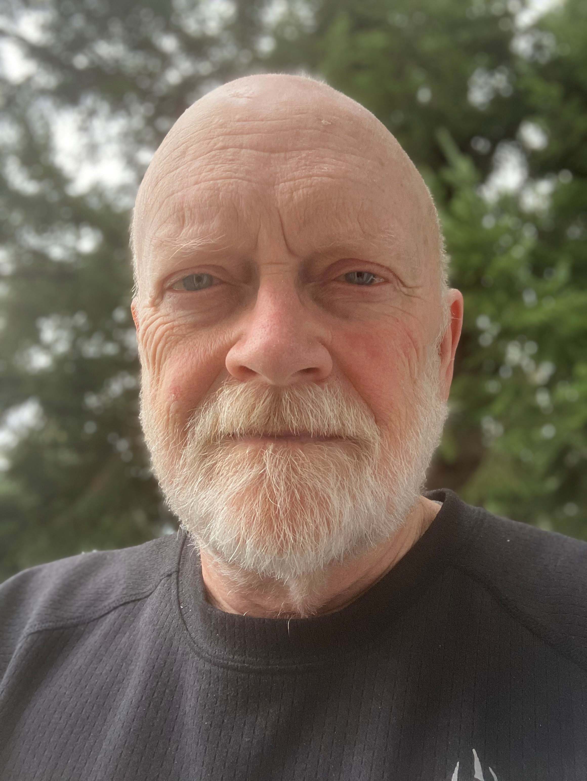 A photo of an older man outside.